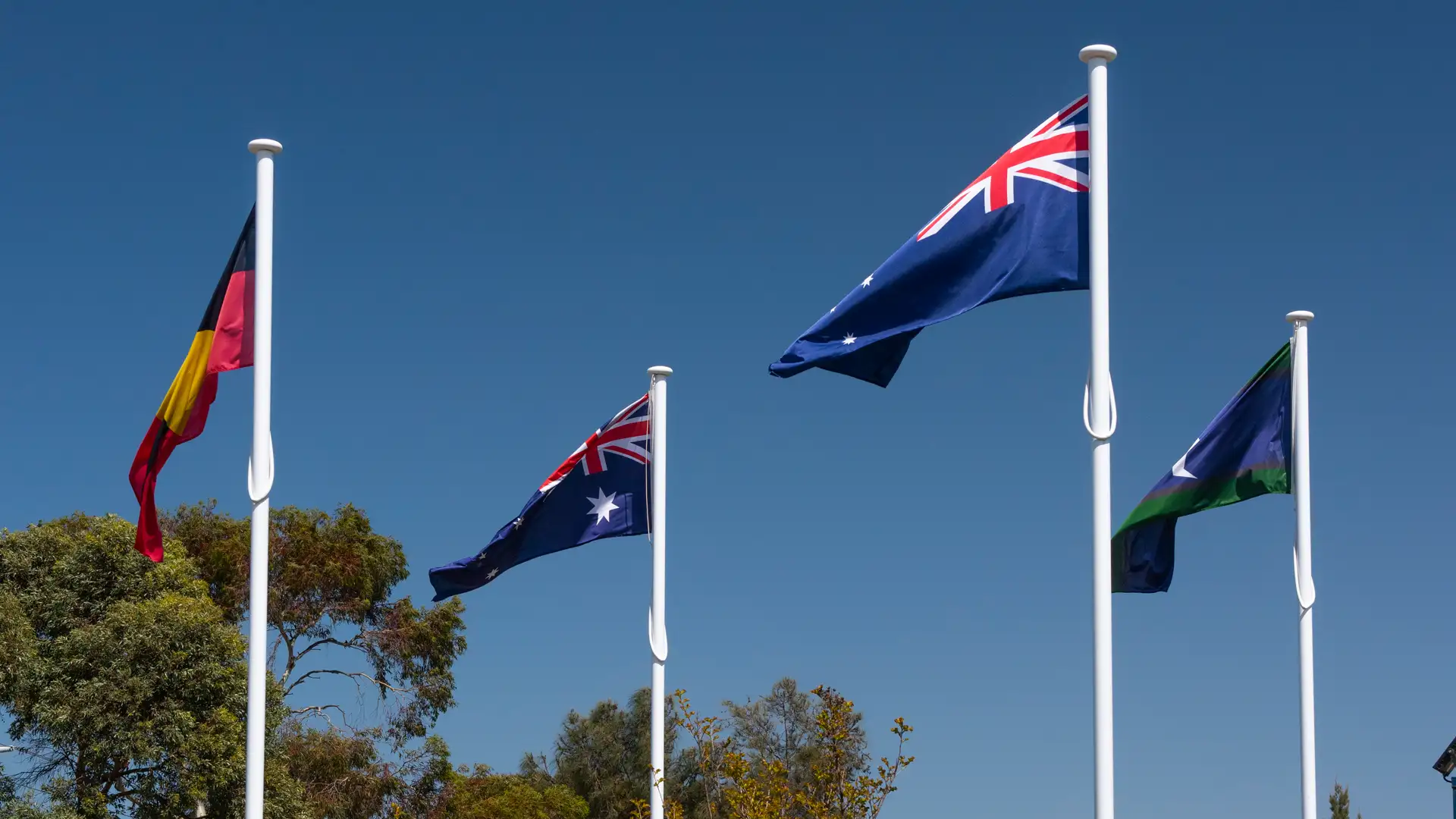 Four Abel flagpoles installed at a memorial site